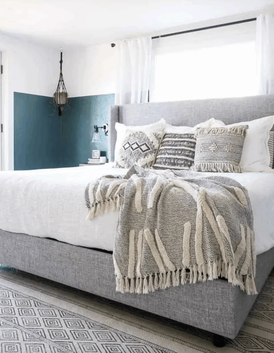 teal and grey styled guest bedroom