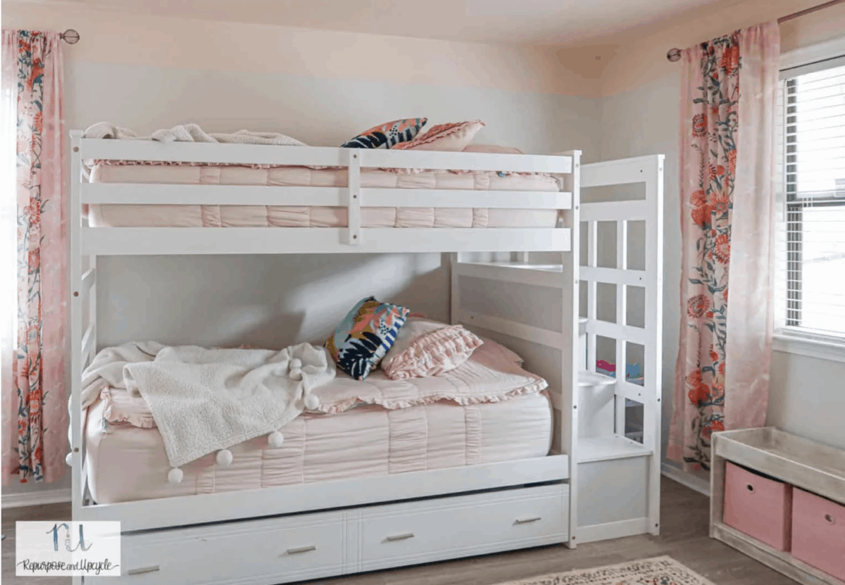 girls pink bedroom with bunk beds