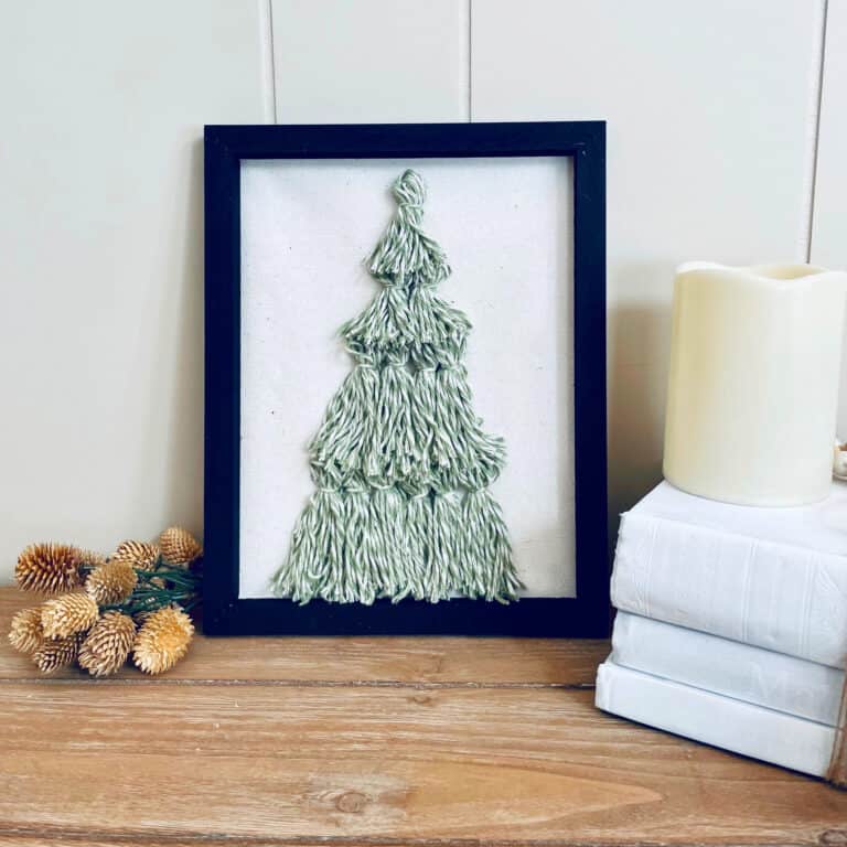 diy tassel Christmas tree sign on shelf