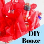 mini liquor bottles wrapped with red tissue paper