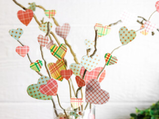 paper hearts glued to twig branches