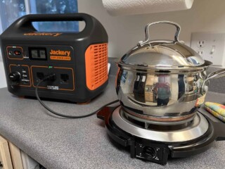 pot on a portable electric burner plugged into a Jackery