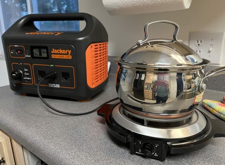 pot on a portable electric burner plugged into a Jackery