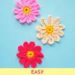 crocheted flowers on blue background