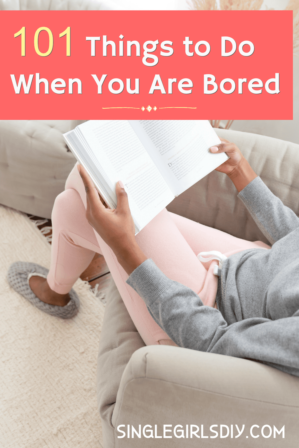 woman sitting on couch reading a book
