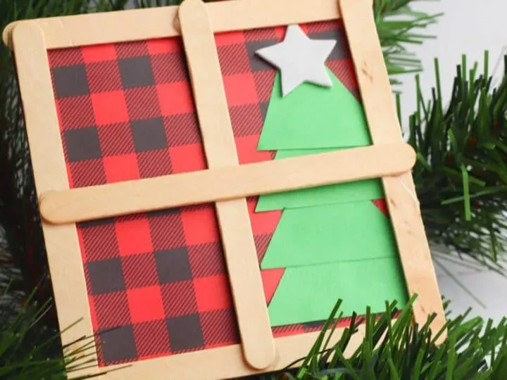faux Christmas window made out of popsicle sticks
