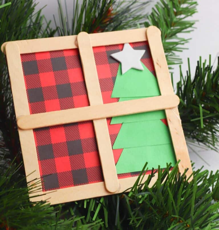 faux Christmas window made out of popsicle sticks