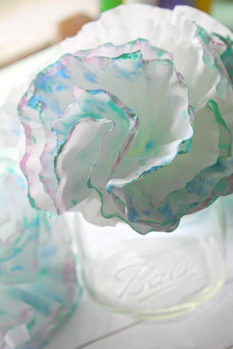 beautiful handmade coffee filter carnation flower in glass jar