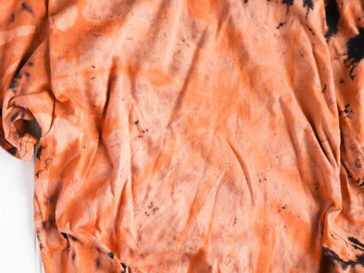 black turned orange shirt from bleached tie dye