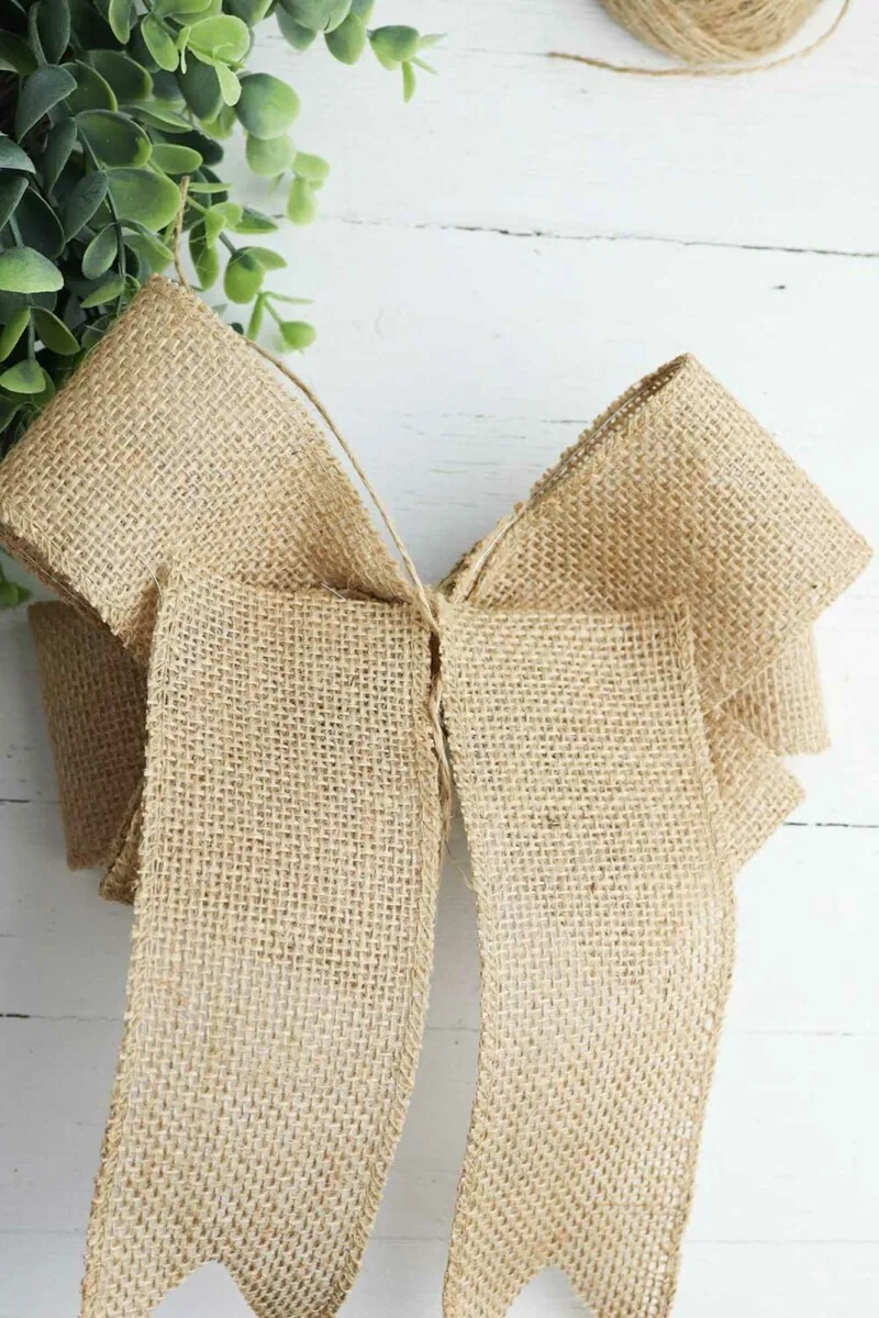 2 pieces of burlap glued to the back of burlap bow