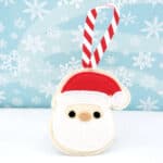 Santa cookie ornament with striped hanging loop