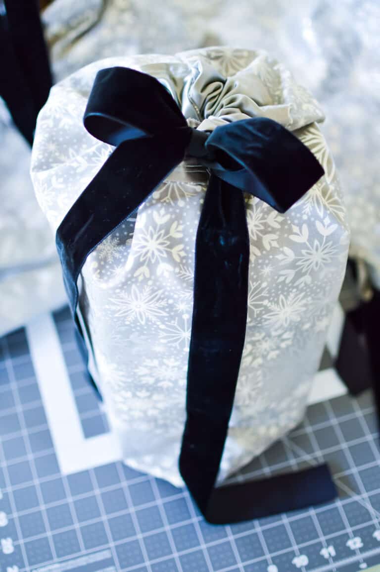 snowflake gift bag with navy bow