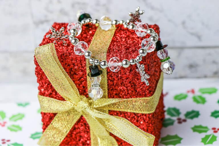 handmade snowman bracelet on red glitter small present