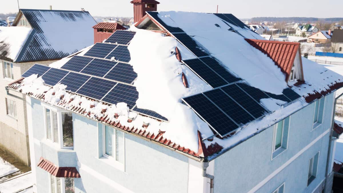 Solar Panels in Winter on Snow Covered Roof
