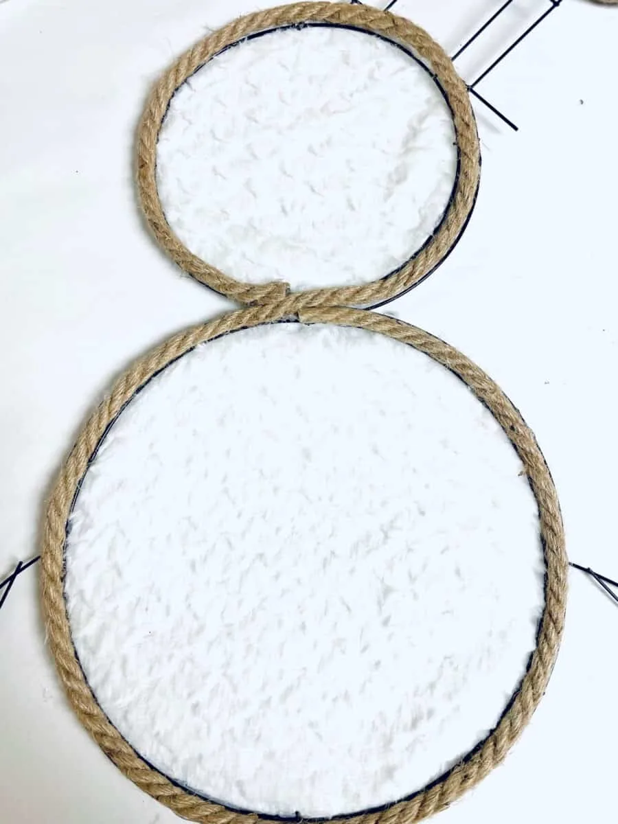 Step 4 adding rope around snowman wreath wire form