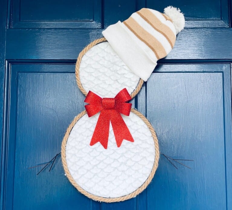 dollar tree snowman wreath on blue front door