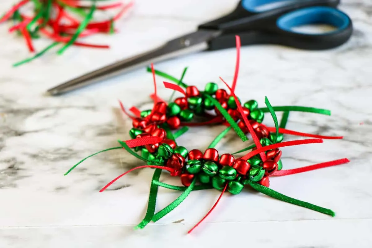 Jingle Bell Bracelet with red, green and silver seed beads. Gold