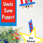 wooden spatula painted like Uncle Sam displayed against white background