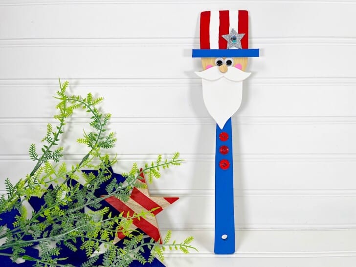 Wooden Spoon Uncle Sam Craft On White Wood Wall
