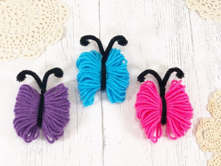 Yarn Butterly Purple Blue and Pink on White Background