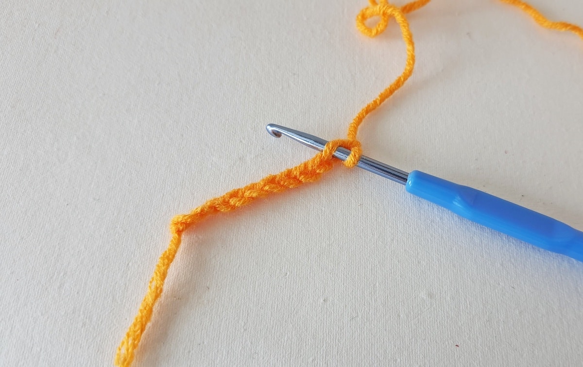 Crochet Pumpkin Step 2 against a white background