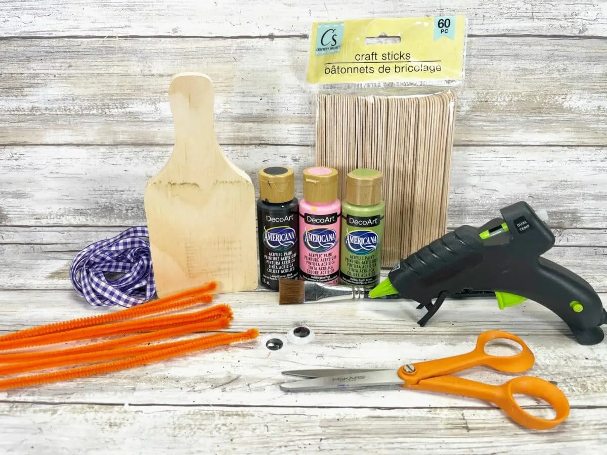 A craft kit with scissors, glue, and other supplies.