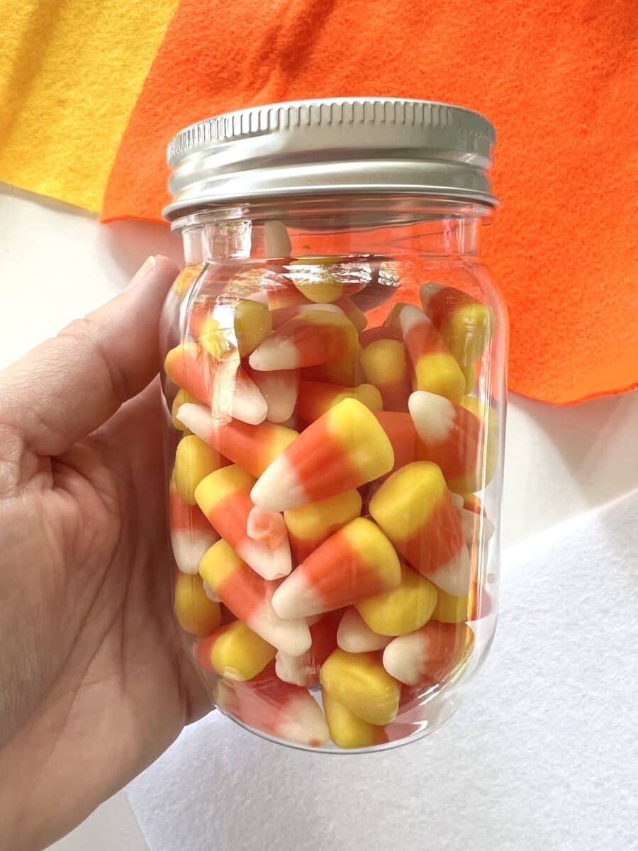 Candy corn gnome in a mason jar.