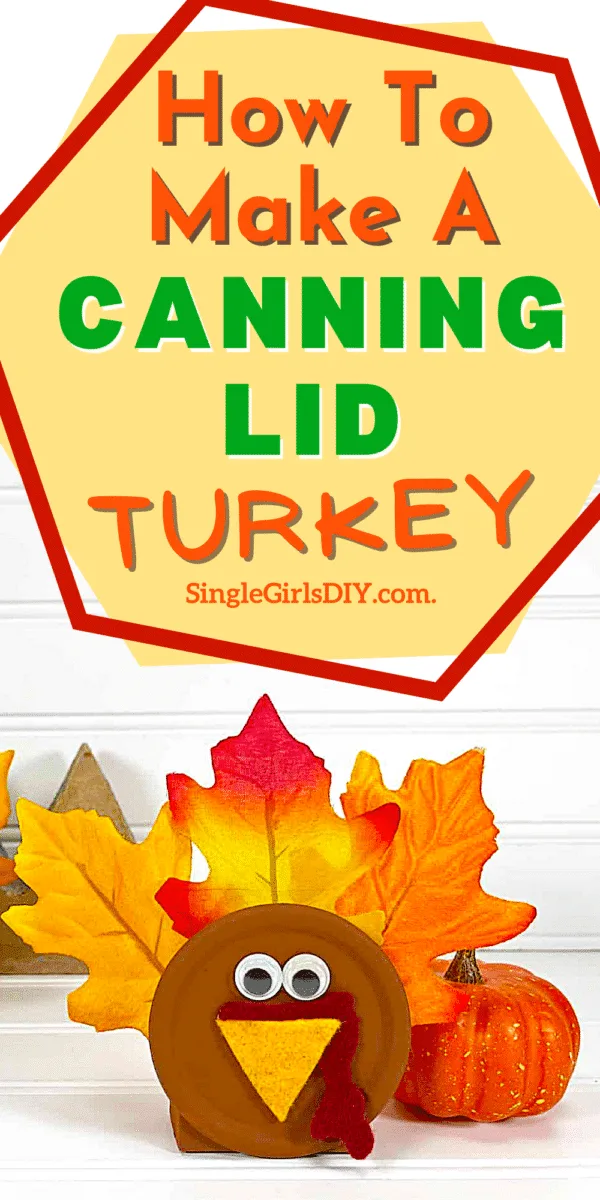 canning lid turkey craft shown against a white wood background