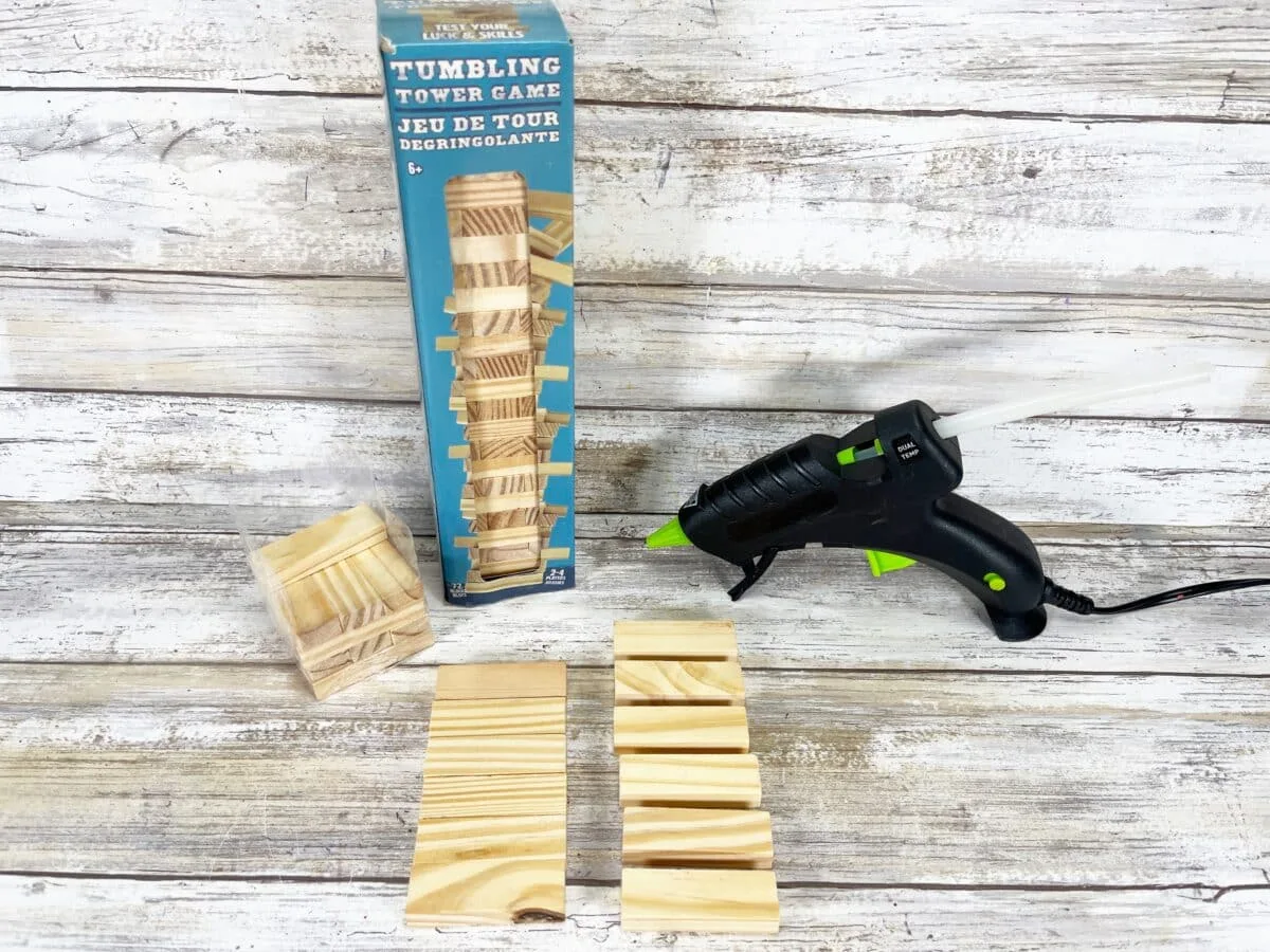 A stack of wooden blocks and a glue gun.
