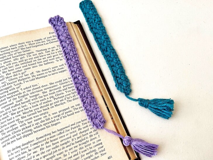 Crochet Bookmark With Open Book on white table