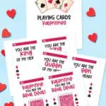 printable Valentine's Day Playing Cards against a blue background with red hearts