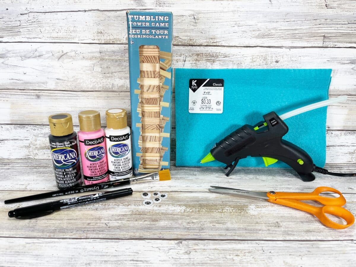 A craft kit with paint, glue and scissors.