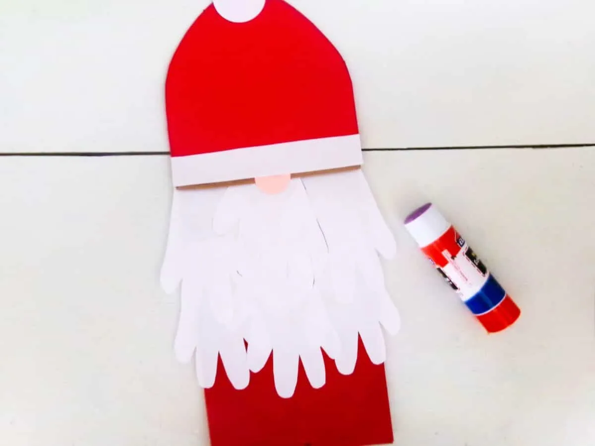 A handprint Santa Claus paper craft.
