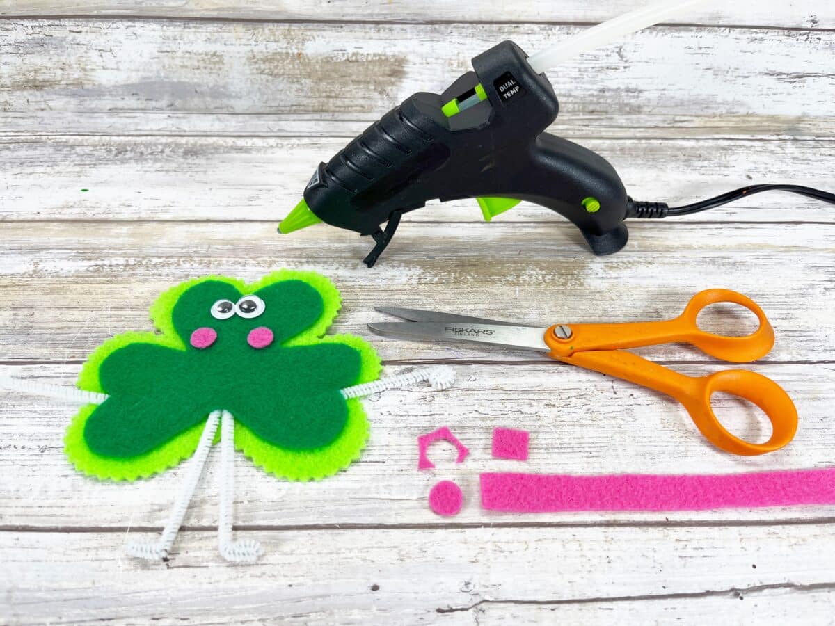 St patrick's day craft with a glue gun and scissors.