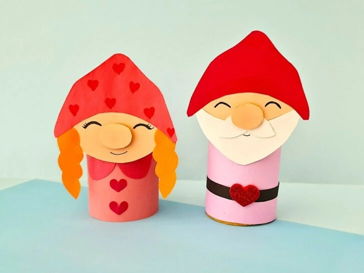 Valentine Gnomes with red hats on blue background