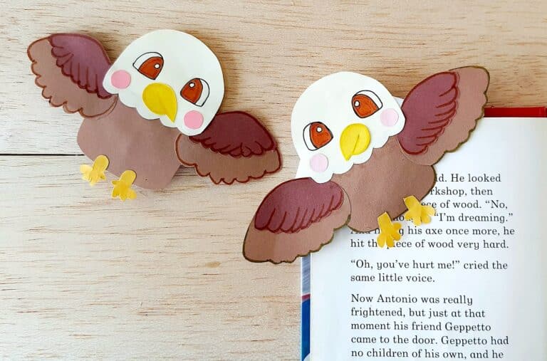 Bald Eagle Bookmarks placed on an open book sitting on a wooden table top.