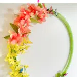 Diy tutorial: crafting a spring floral hula hoop wreath.