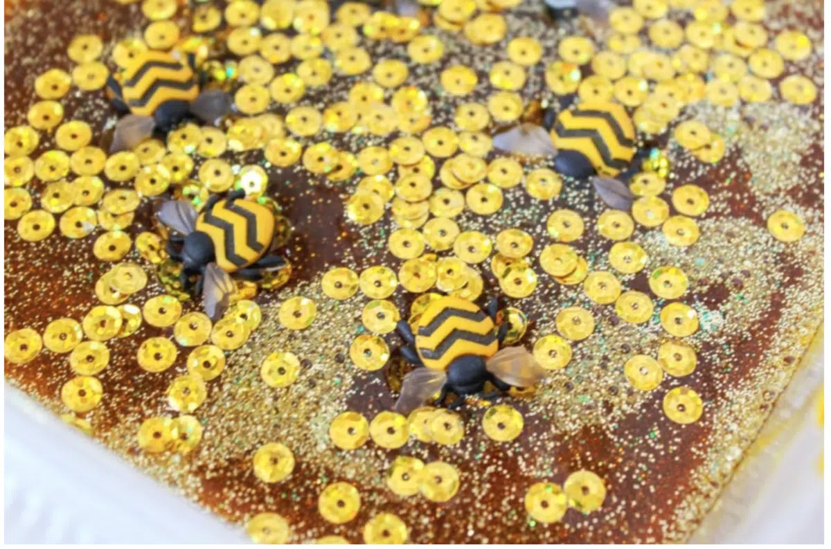 gold sequins glitter plastic honey bees in slime mixture