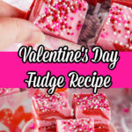 A hand delicately holds a piece of Valentine fudge, its pink and red squares adorned with festive sprinkles, hovering above a plate brimming with these sweet treats.