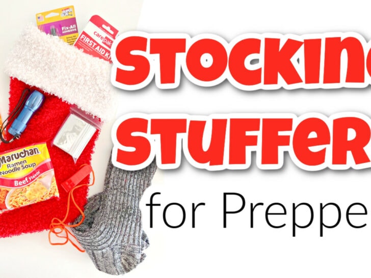 Red stocking with prepper items like hand warmers, emergency blanket, flashlight, noodles, socks, and first aid. Text reads 