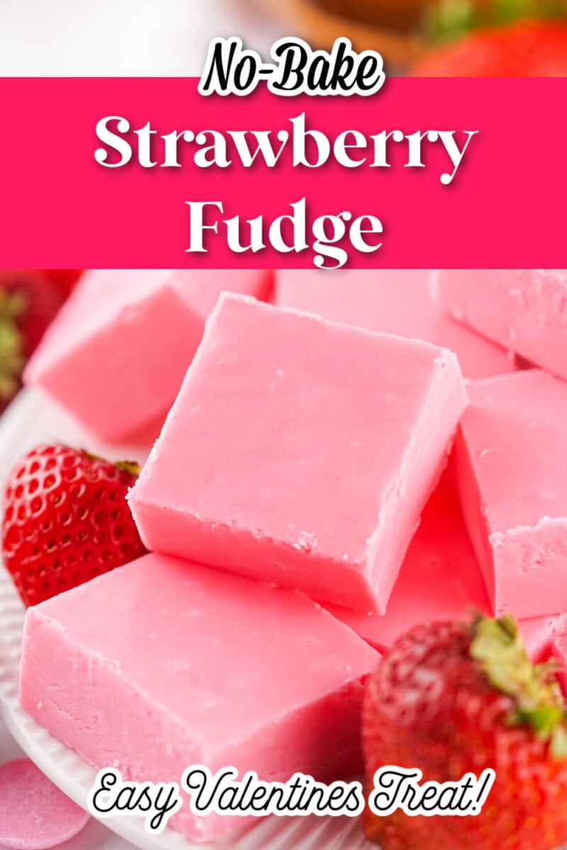 A plate of pink strawberry fudge squares, surrounded by fresh strawberries, with text overlay: "No-Bake Strawberry Fudge, Easy Valentines Treat!.