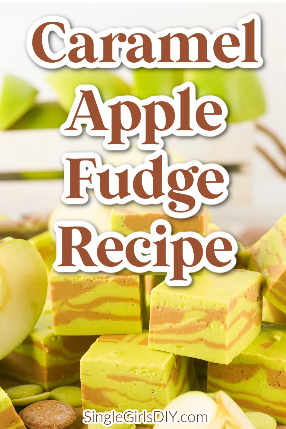 Blocks of caramel apple fudge are stacked on a surface with fresh apple slices nearby. The text "Caramel Apple Fudge Recipe" appears over the image, along with the website SingleGirlsDIY.com.