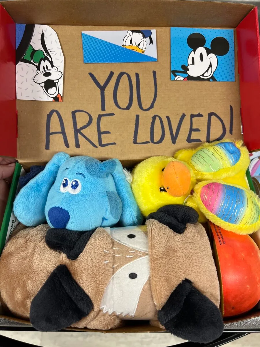 A box with stuffed animals and a note, prepared for Operation Christmas Child.